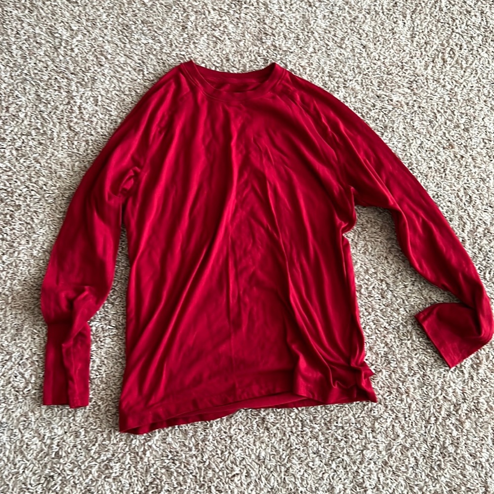 Red long sleeve shirt used size small.